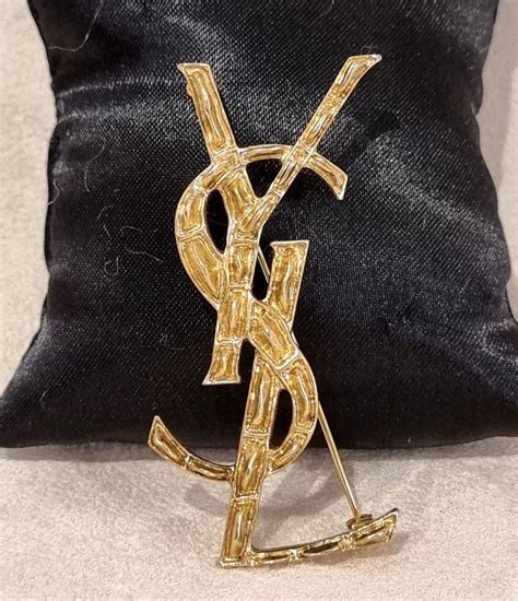 ysl brooch black|ysl brooch sale.